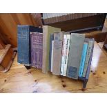 Book trough with a quantity of book to include a Mrs Beaton's, Kings English Dictionary, Freedom