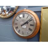 Wall clock in pine case