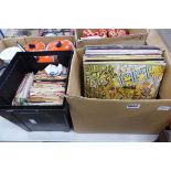 2 boxes containing vinyl records