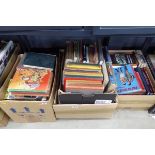 Underbay with 3 boxes containing childrens annuals, books and agricultural guides