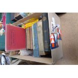 Box containing general knowledge and science books and novels