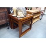 Nest of three tiled topped teak tables