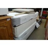 Pair of single divan bed bases with mattresses and headboard
