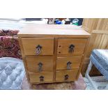 Pine table top six drawer storage cabinet
