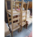 Four beech dinning chairs with drop in strung seats