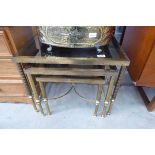 Nest of 3 brass and glazed tables