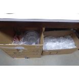 2 boxes containing tumblers, wine glasses and various dishes