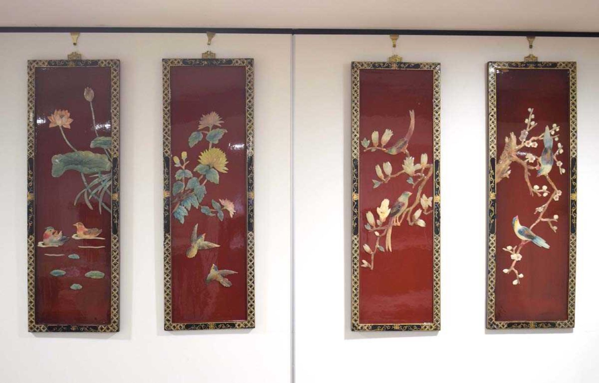 A set of four Japanned and red lacquered screens relief decorated with birds and foliage, 92 x 30 cm - Image 2 of 2
