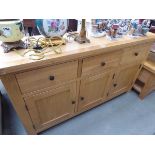 Modern oak sideboard, three drawers over three doors