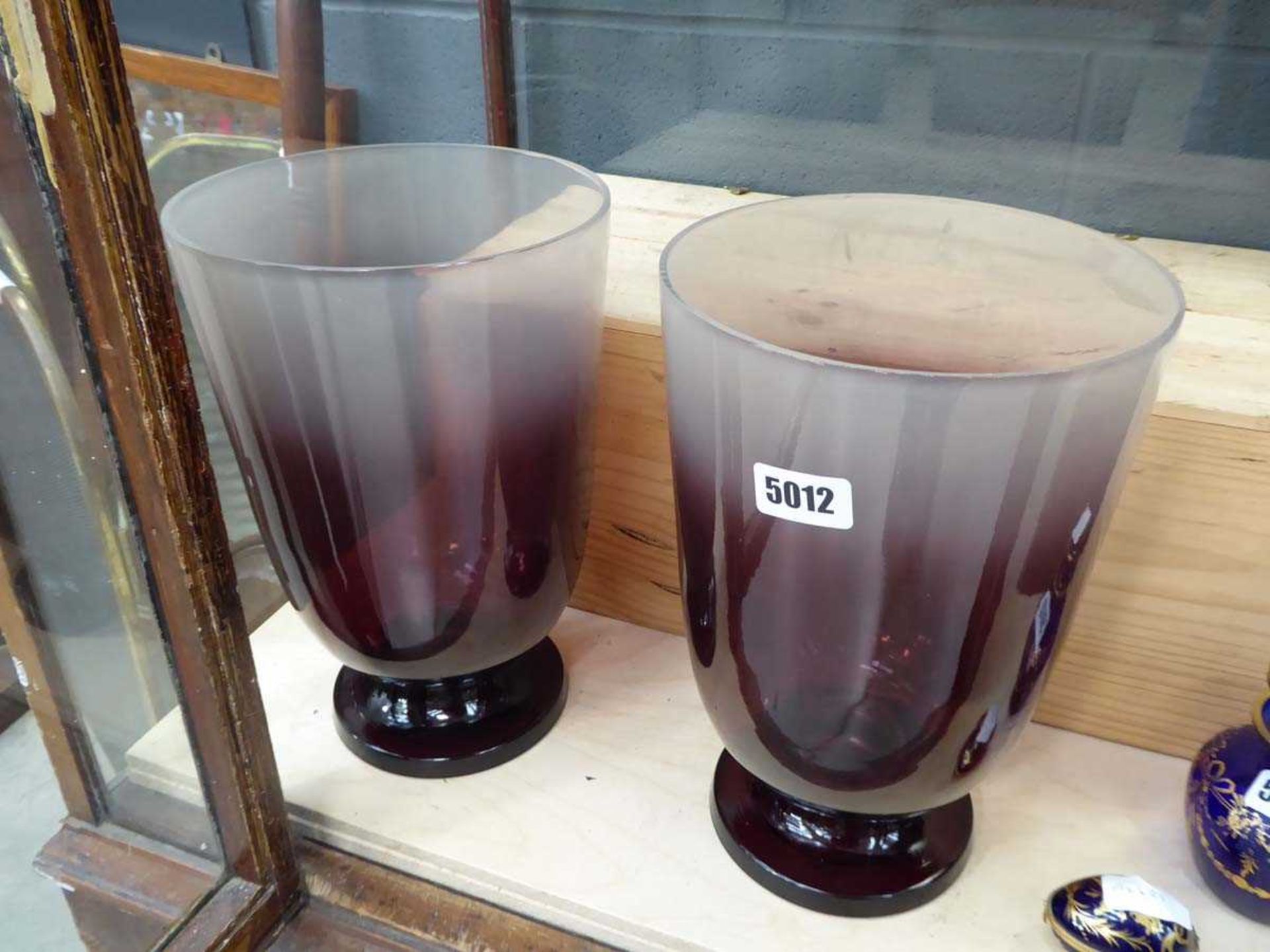 A Pair of large coloured glass vases