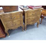 A pair of serpentine fronted 2 draw bedside cabinets
