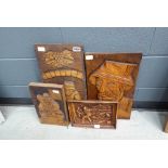 4 carved wall hangings