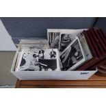 Box containing a qty of postcards depicting rock and roll legends plus coastal scenery