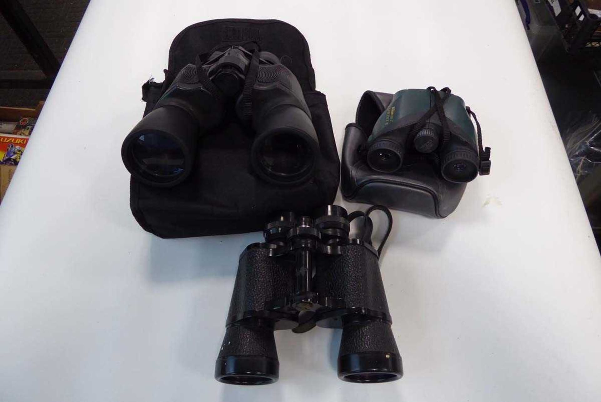 3 various pairs of binoculars