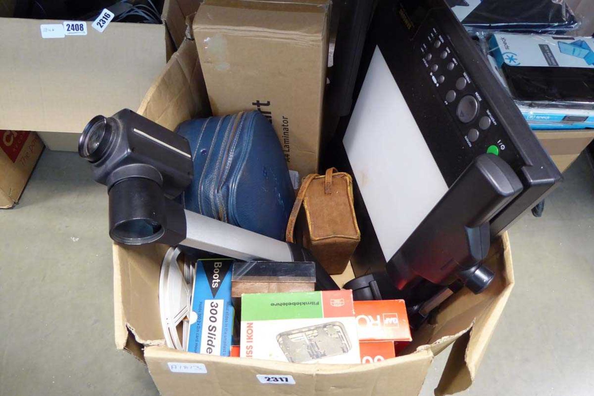 Box of various vintage camera equipment, overhead projector etc.