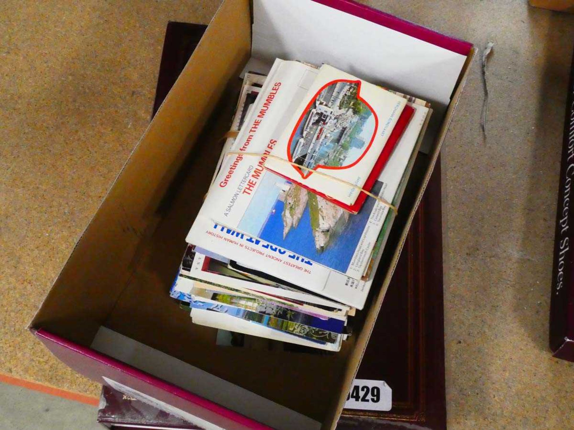 Box and album of postcards