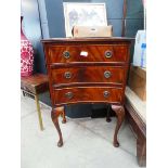 Small inverted bow fronted chest of 3 drawers