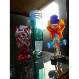 Two cut glass Melting Pot vases and a carnival glass clown