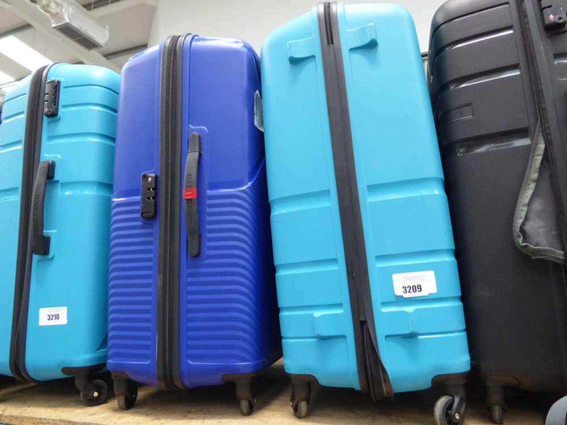+VAT 2 large hardshelled American Tourister suitcases in dark blue and light blue
