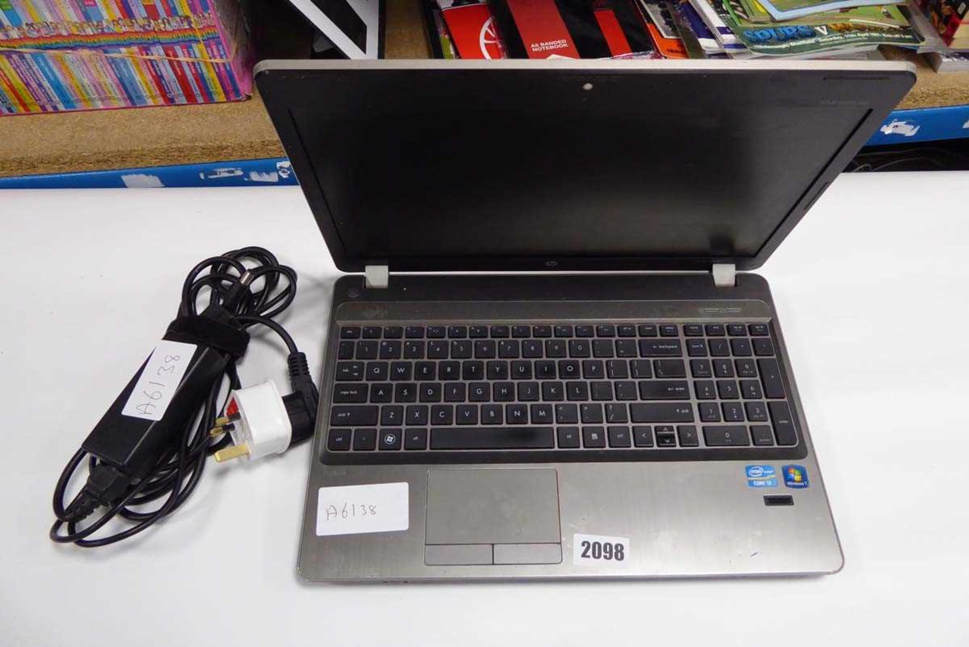 HP laptop with Core i3 processor and power supply, Windows 7