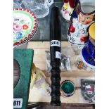 Dark wood truncheon