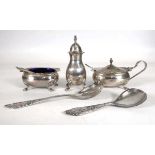 A late 20th century silver three piece cruet set, maker B&Co., Birmingham 1988 and two plated spoons