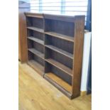 A 20th century Globe Wernicke-style oak open bookcase with adjustable shelves and a plinth base,