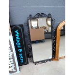 Mirror in wrought iron frame