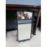 Mirror in wrought iron frame