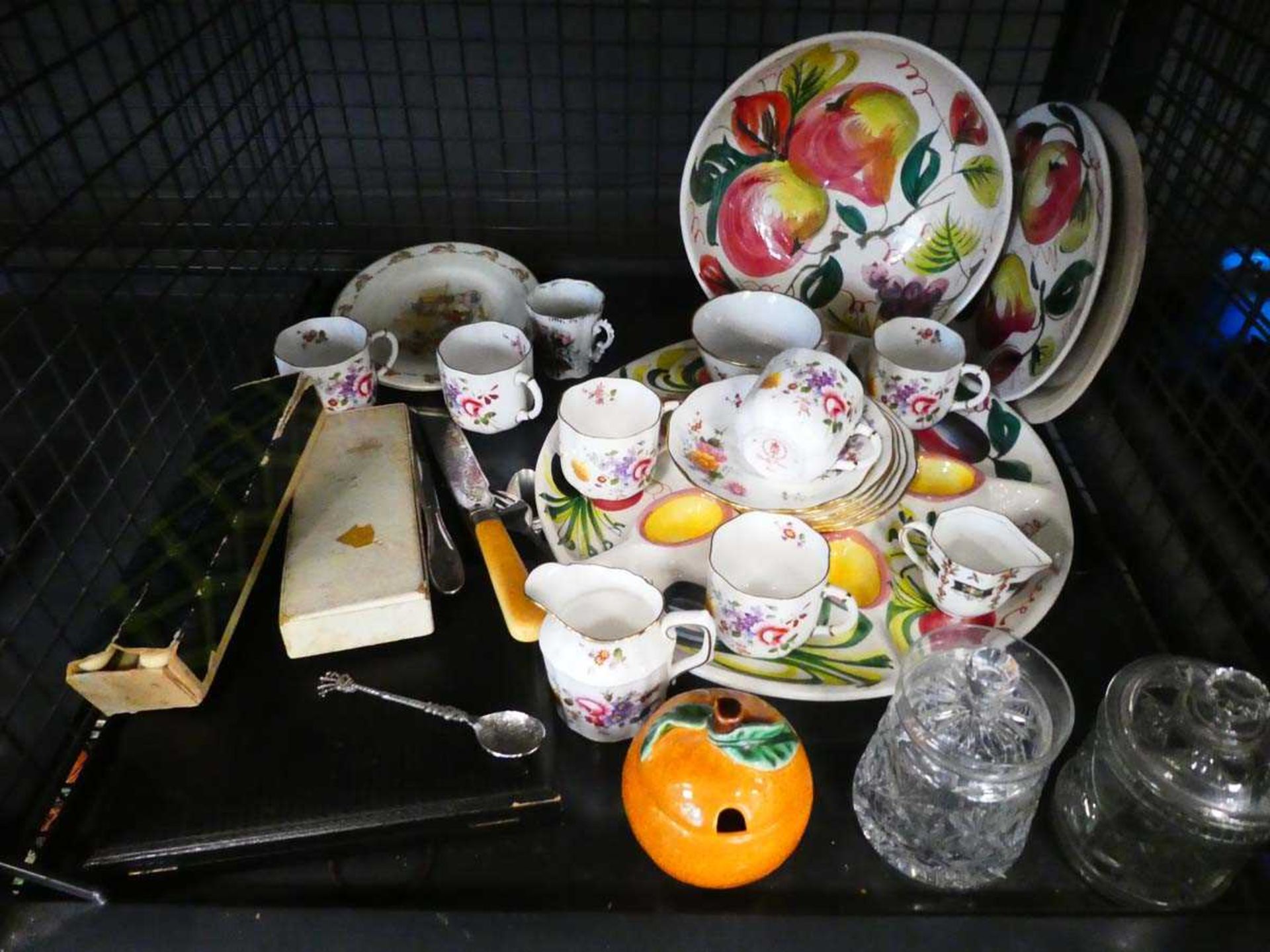 Cage of assorted china to include imported cut glass storage jugs