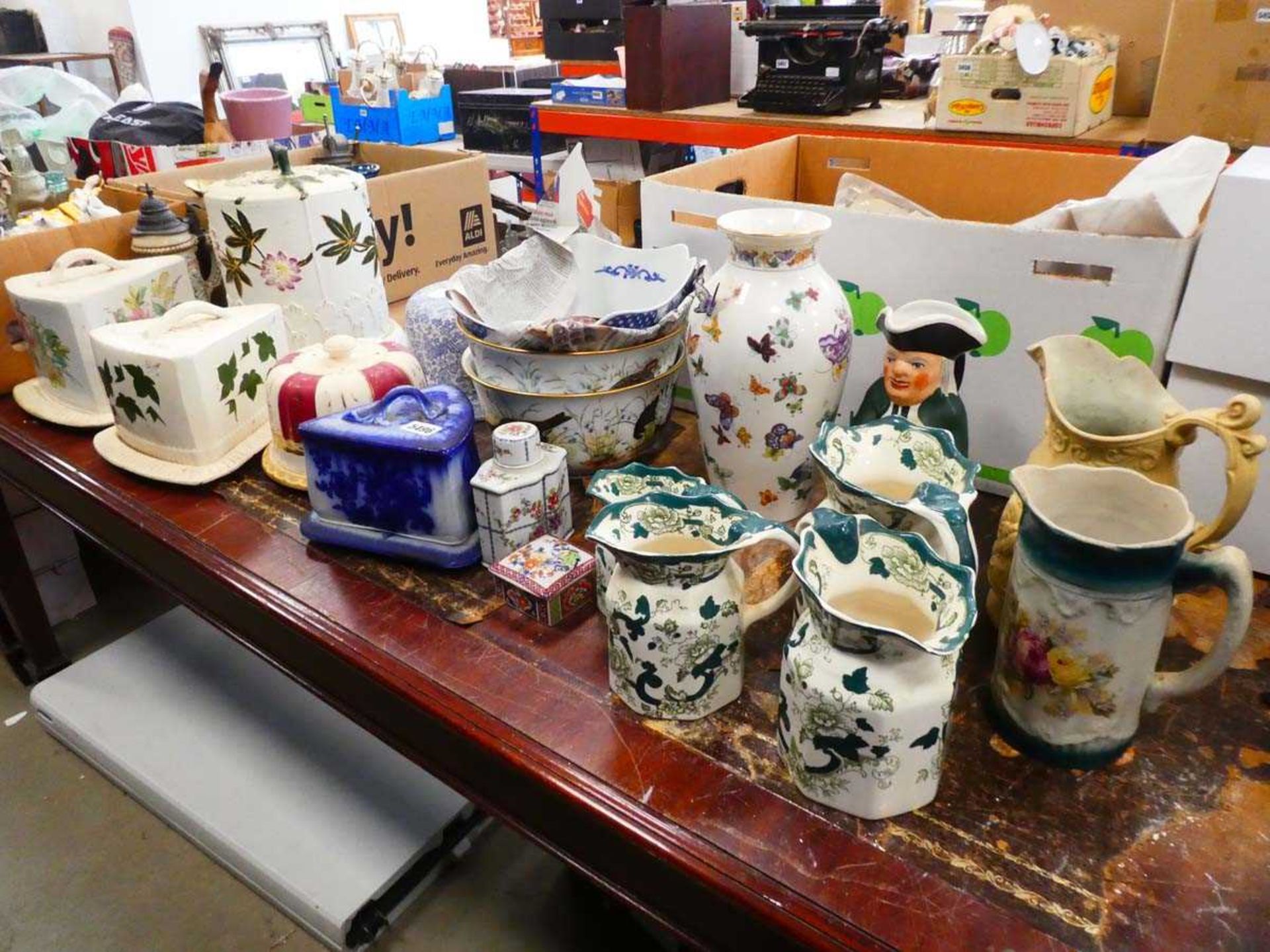 Large quantity of china to include cheese covers, jugs, graduated jugs, butterfly decorated vases