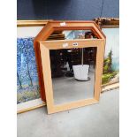 2 wood framed mirrors