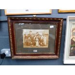 Framed vintage photograph of a family