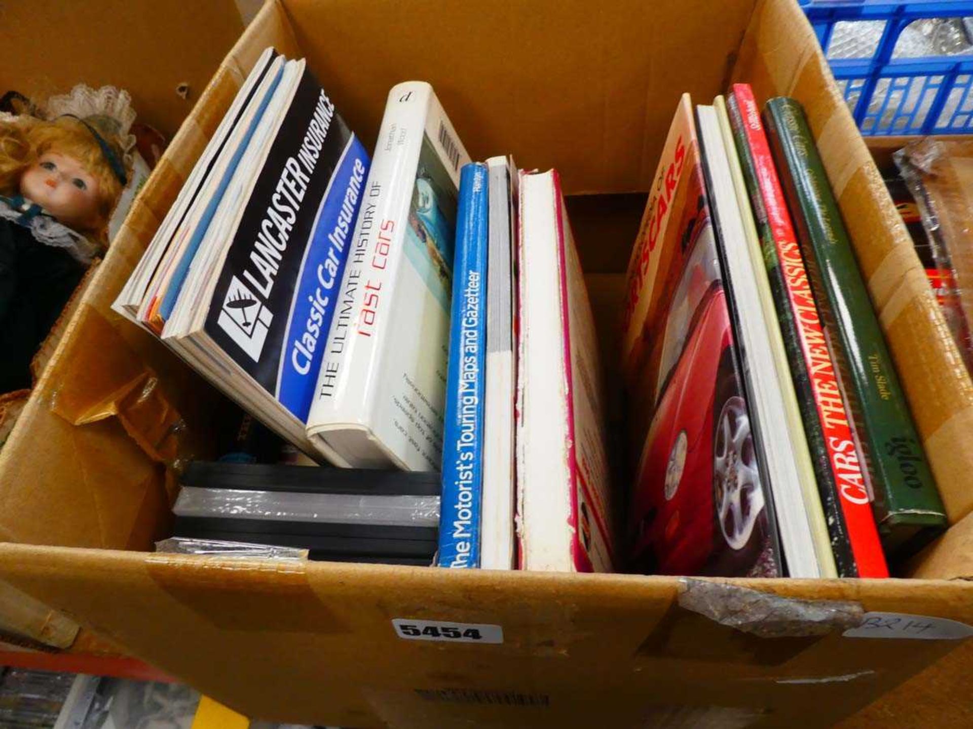 Box of books to include Tuning for Speed, Ultimate History of Fast Cars and motoring books