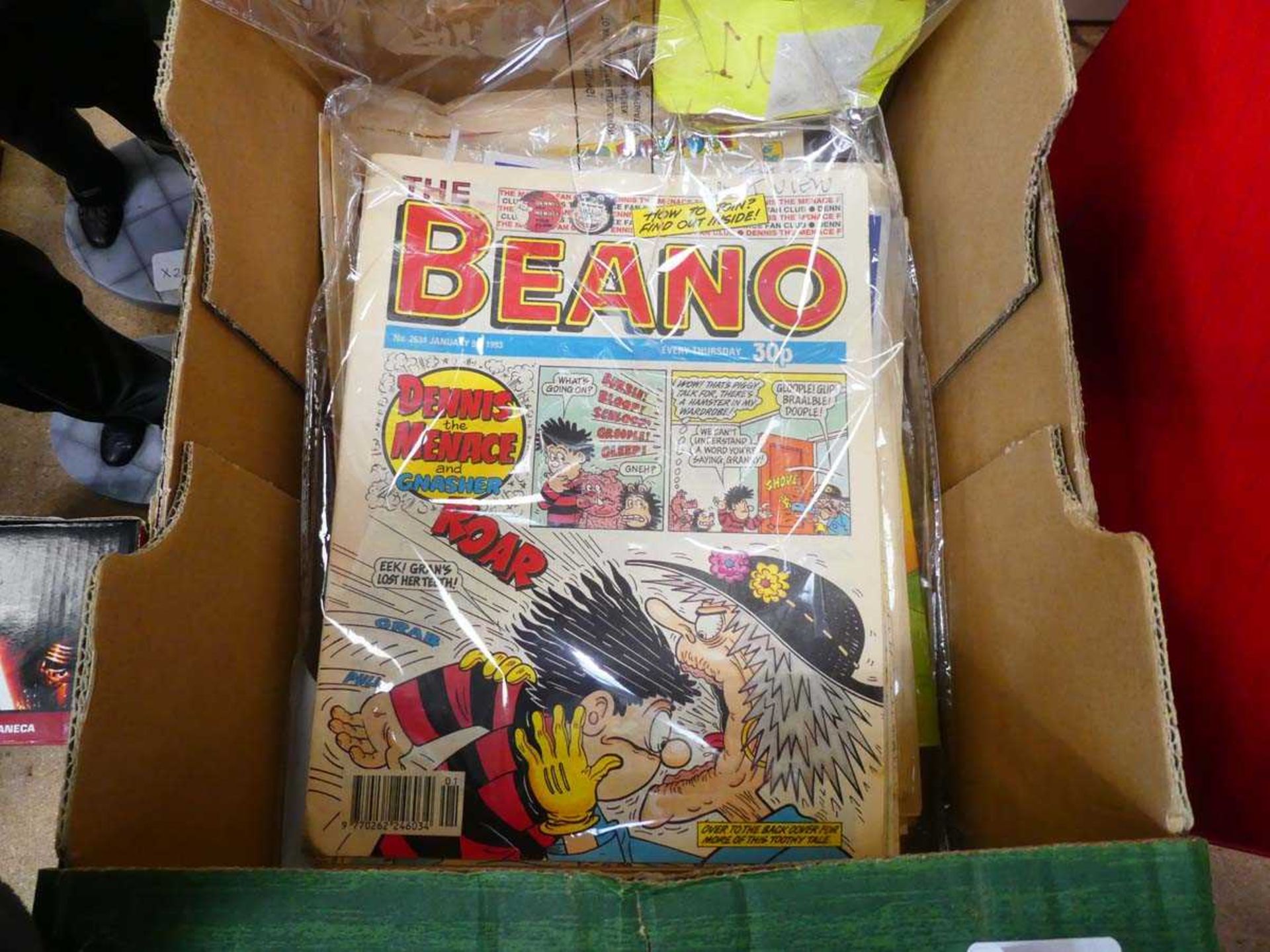 Box containing Beano and Dandy comics