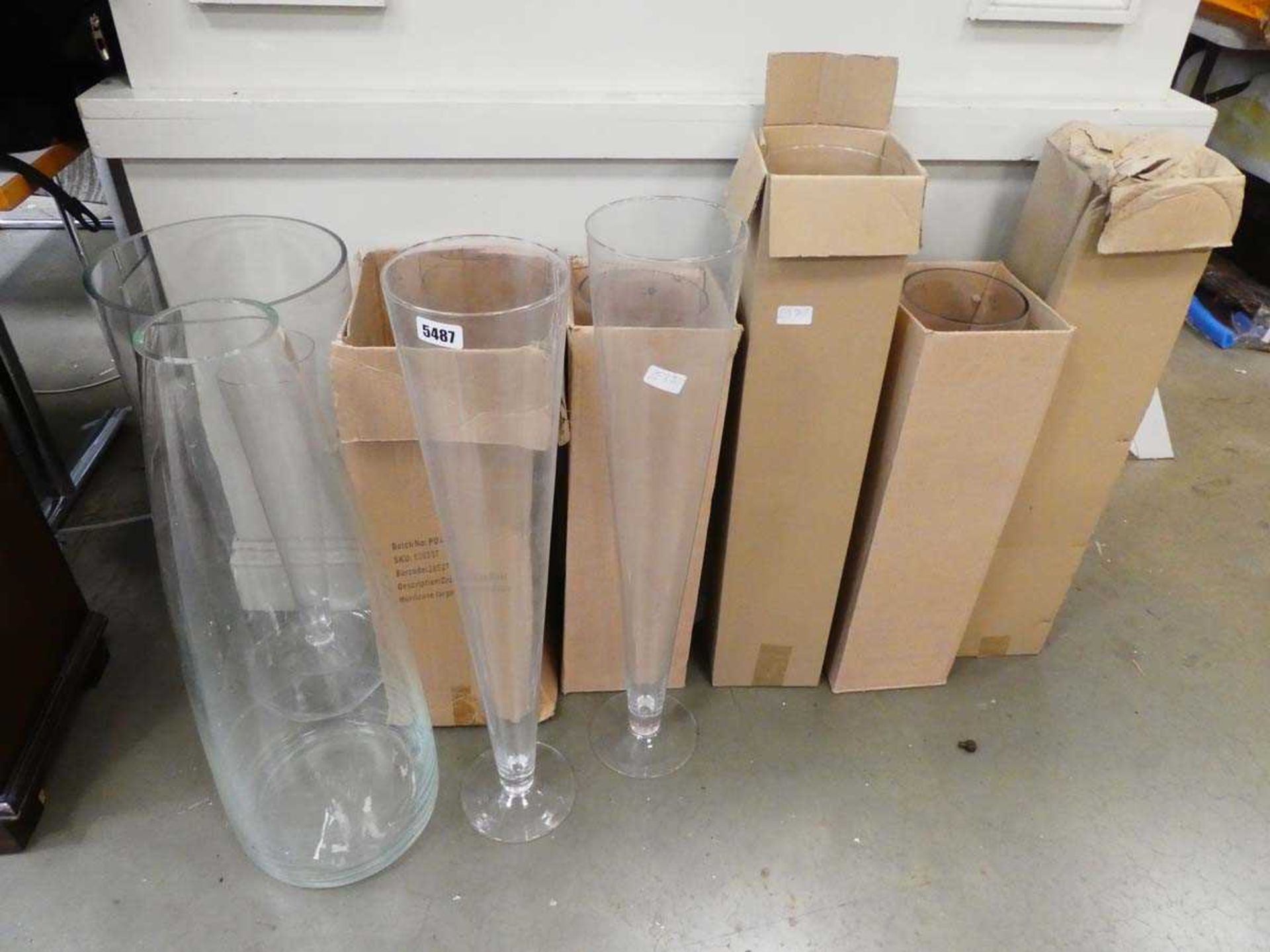 Large quantity of oversized glass vases