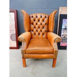 Leather effect wingback armchair