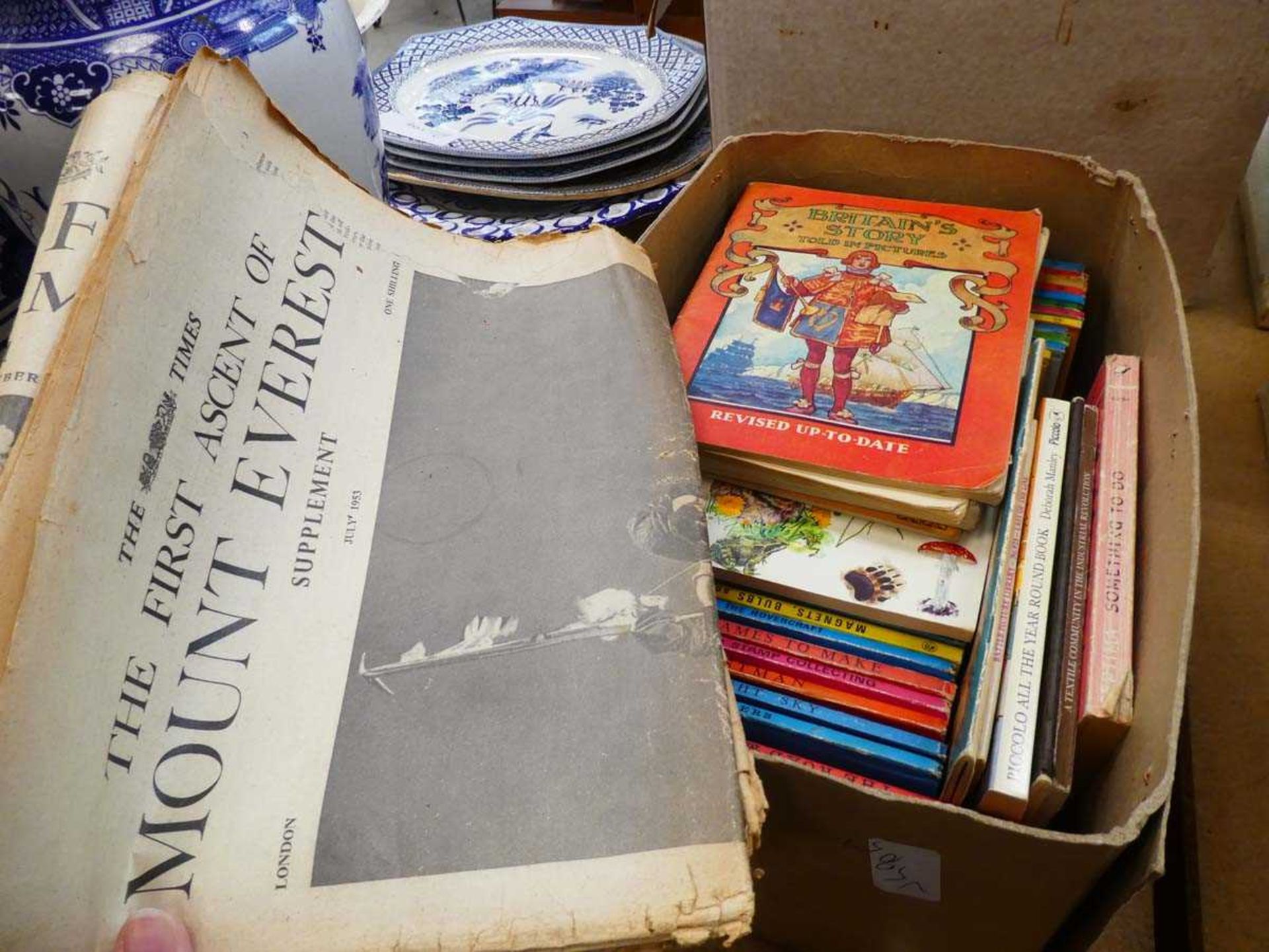 Box containing ephemera and ladybird books