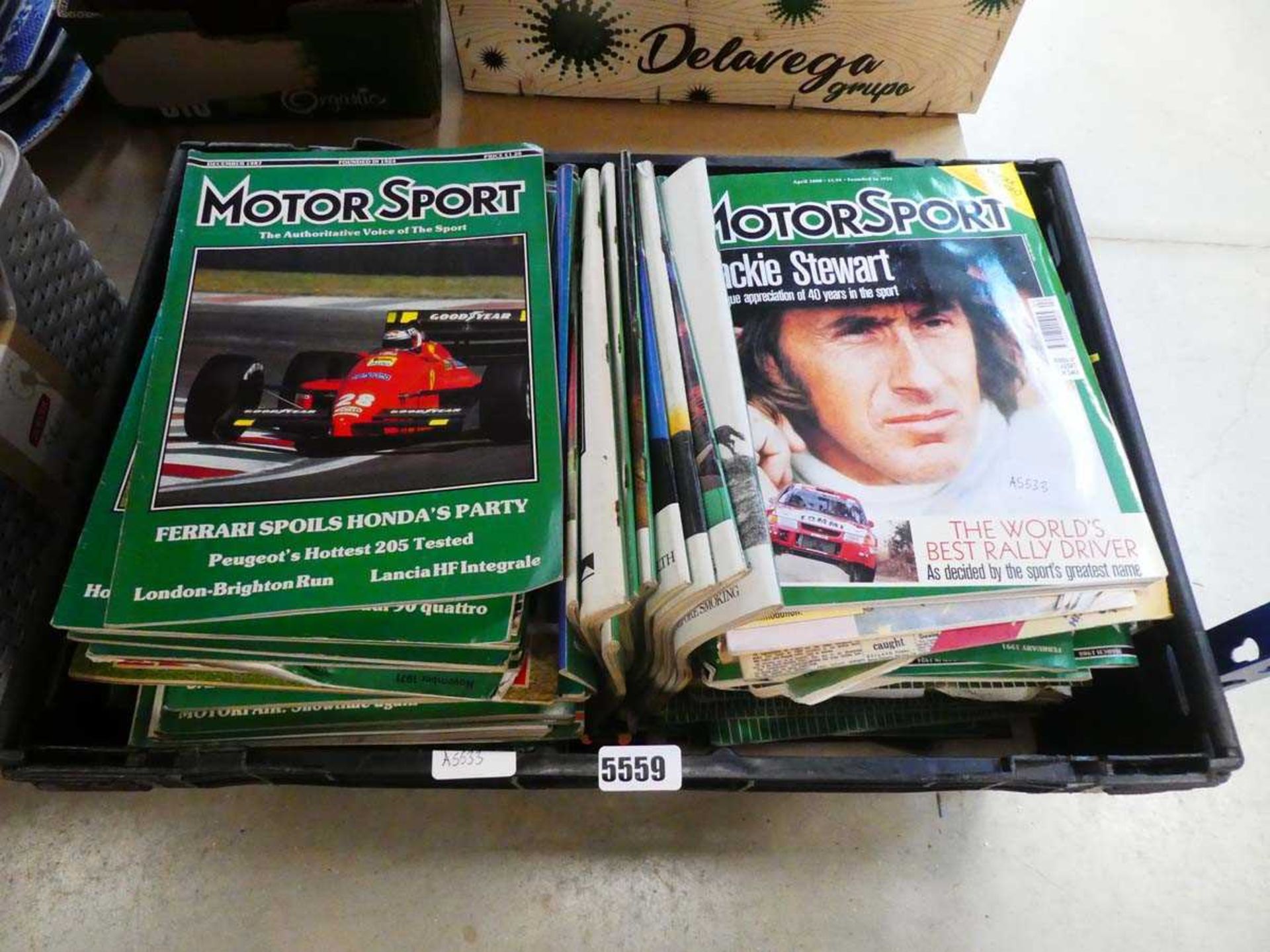 Box containing motorsport magazines