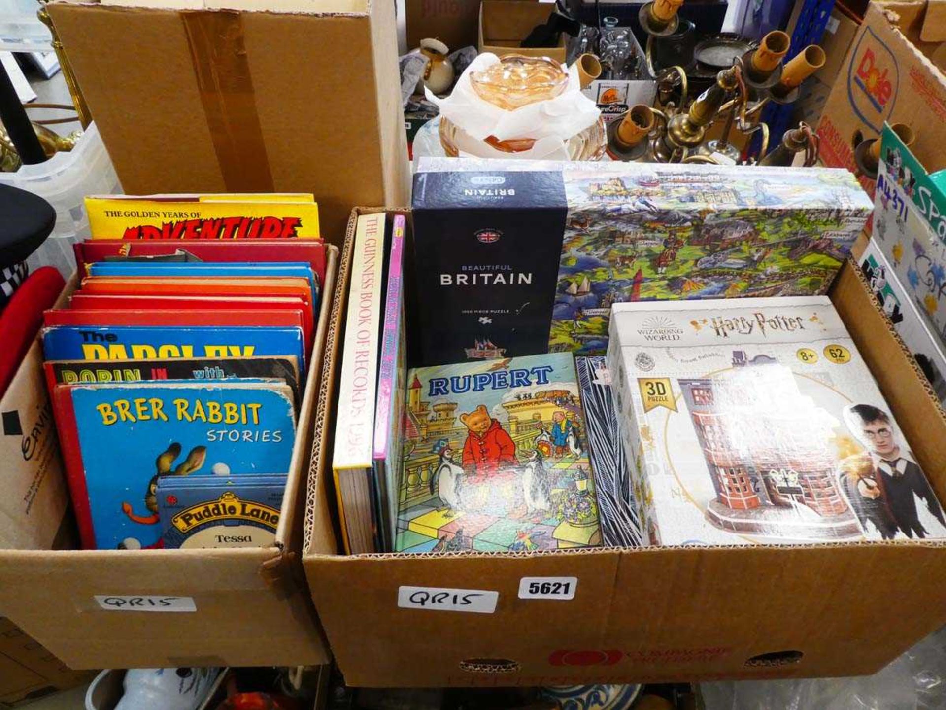 2 boxes containing Rupert and other annuals plus jigsaw puzzles
