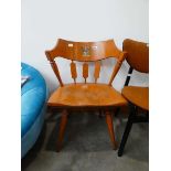 Occasional chair with family crest to the backrest