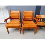 Pair of upholstered oak armchairs