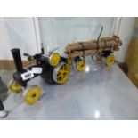 Mamod black and yellow steam tractor with forestry trailer