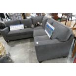 +VAT Dark grey upholstered corner sofa system with metal studded arm details