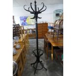 Black wooden floor standing hat and coat stand