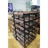 2 wooden and metal wine racks