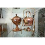 Copper and brass lidded samovar together with a spirit kettle