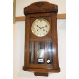 Dark oak cased wall clock