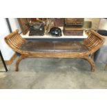 Wooden hall seat with brown leather cushioned surface