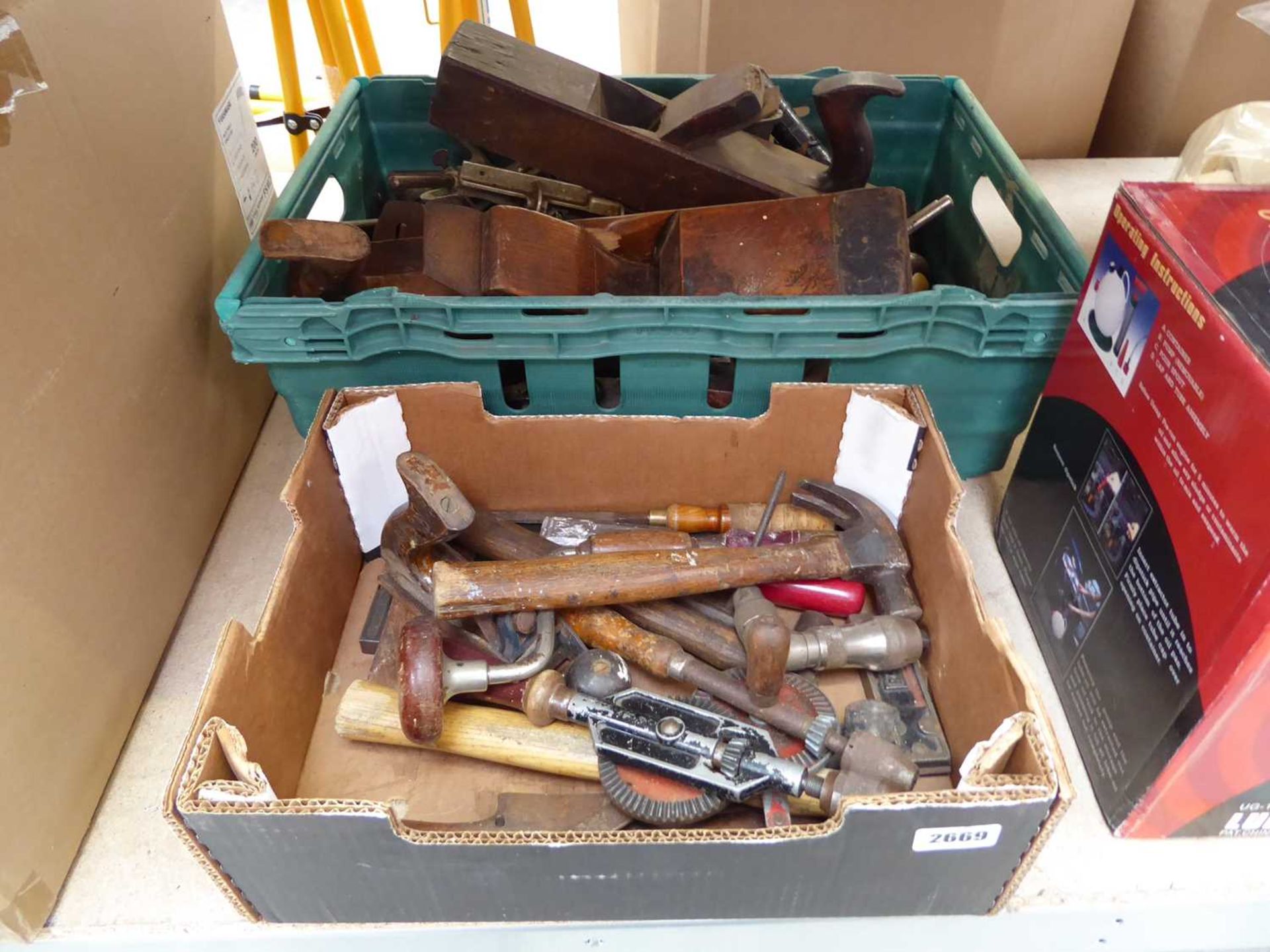 2 boxes containing wood working tools incl. hammers, planers, etc.